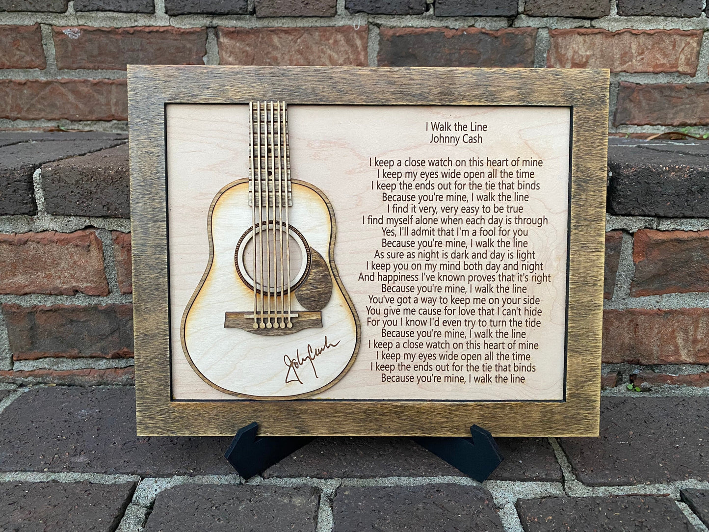 Johnny Cash I walk the line with guitar sign.  Laser engraved on maple. Stand included. Customize to your song.