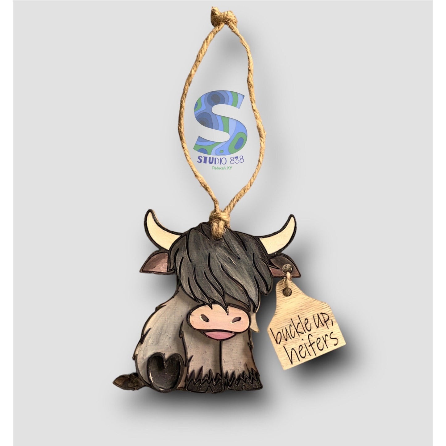 Buckle up, heifers! Highland cow rear view mirror car charm.