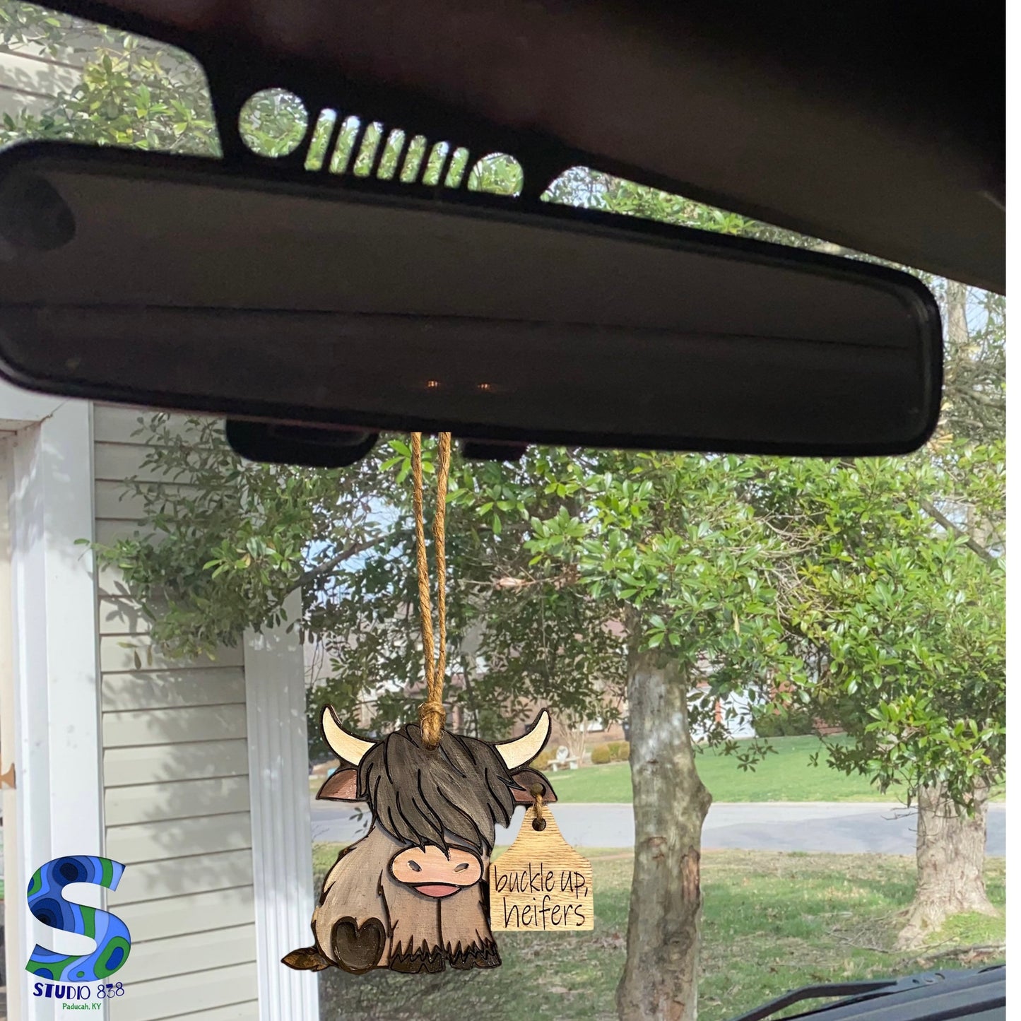 Buckle up, heifers! Highland cow rear view mirror car charm.