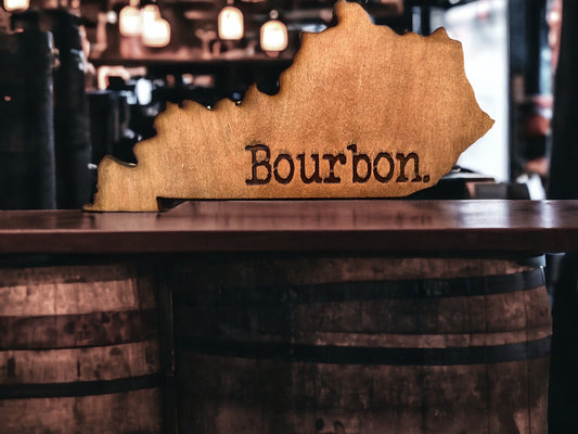 Bourbon Decor . Kentucky state shaped sign.  Table top decor. Laser engraved on maple. Display easel/stand included.